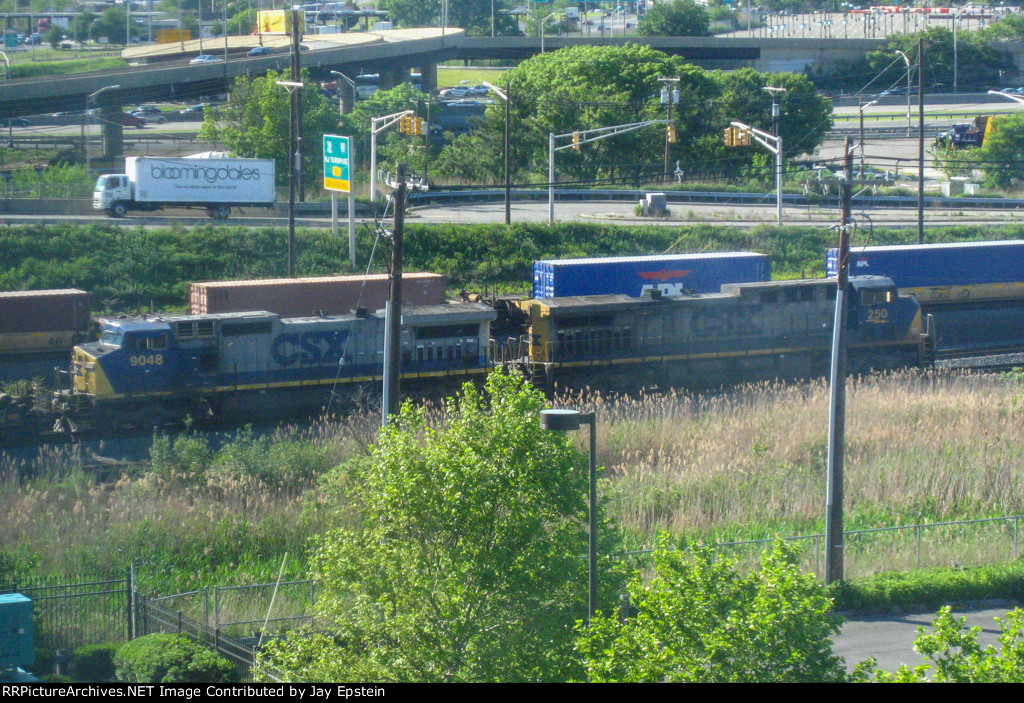 Two CSX GE's switch cars on the Garden State Secondary